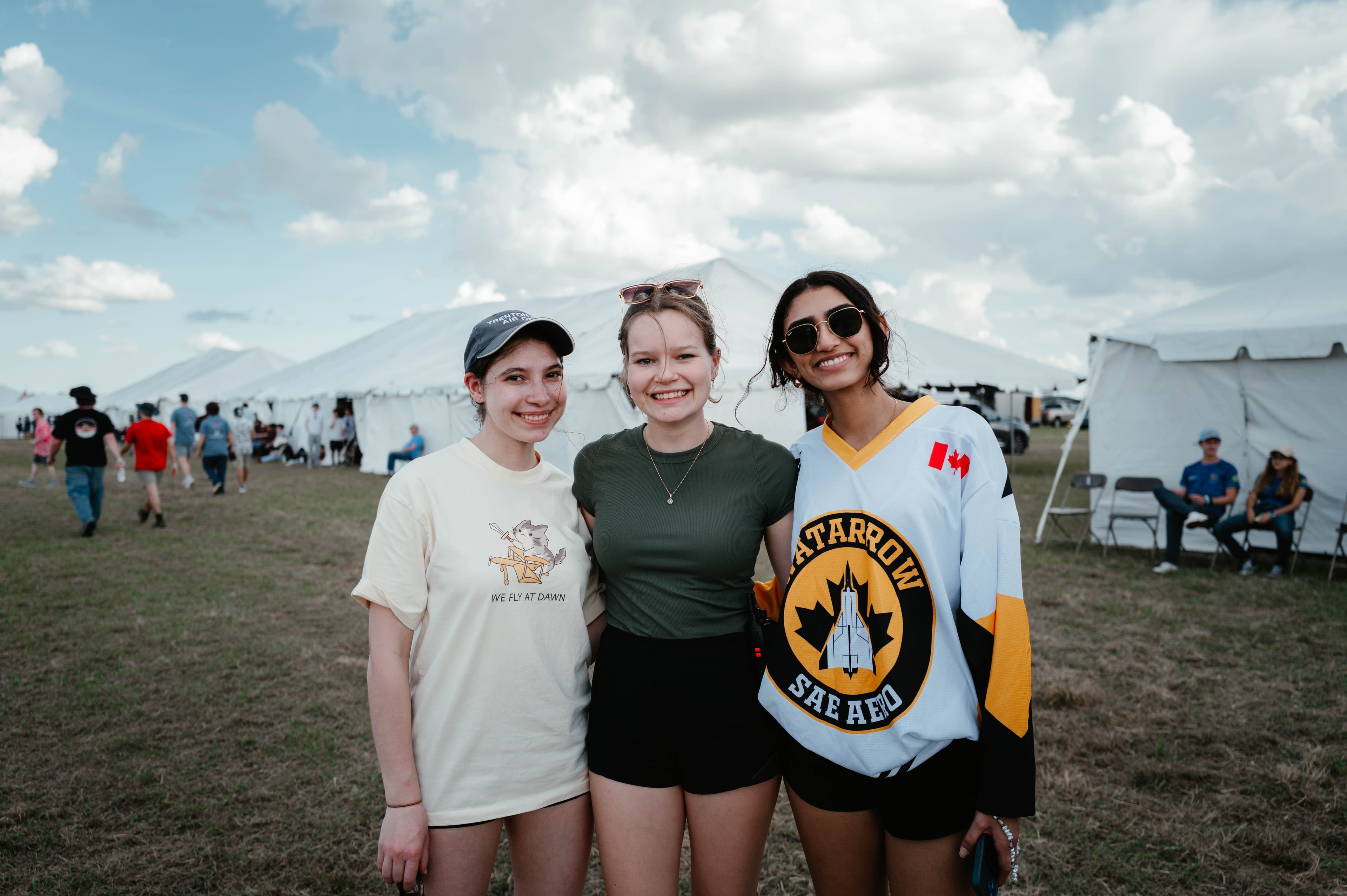 WatArrow members staying cool with their hockey jerseys in the sun
